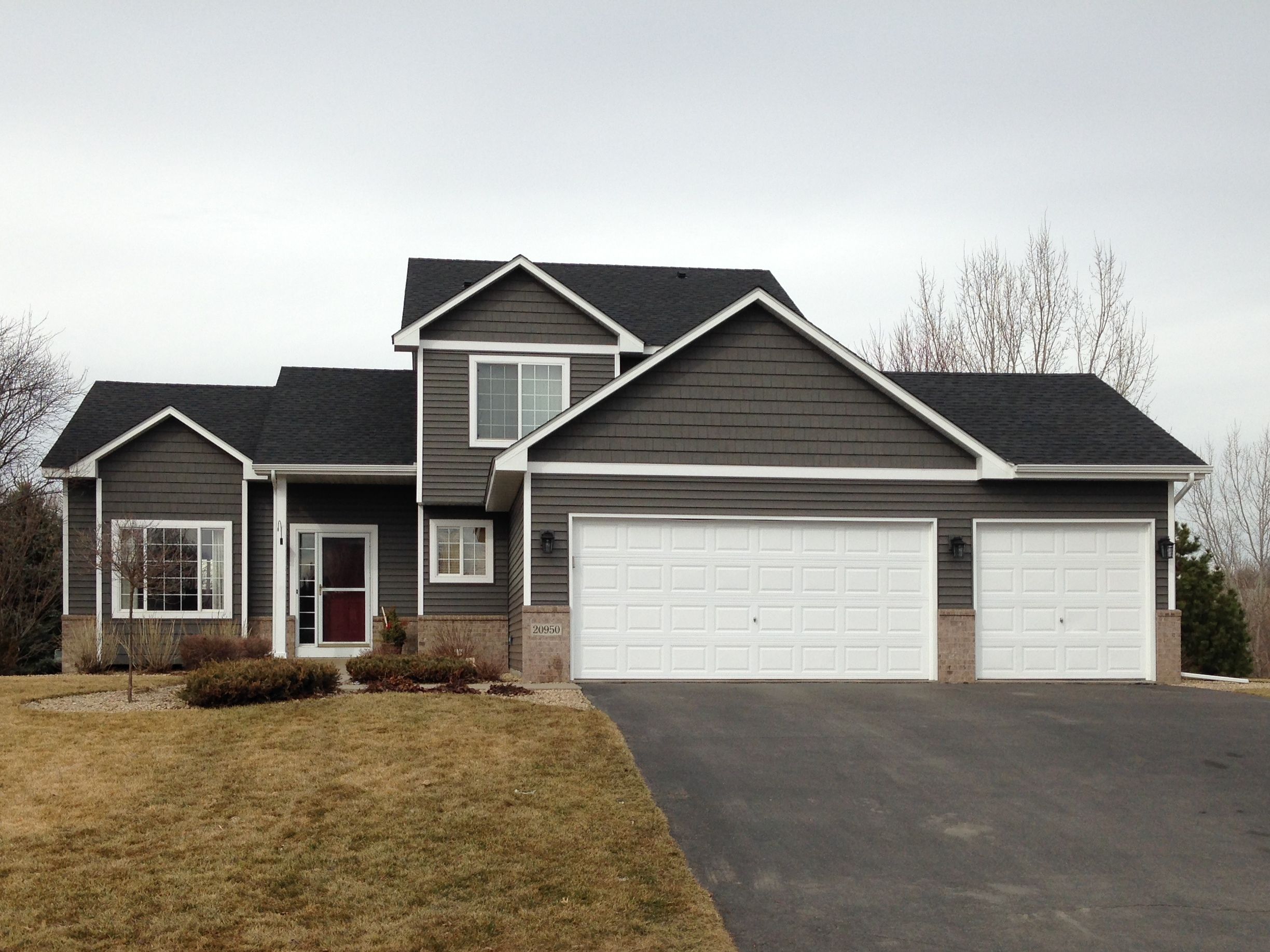 Gray house with a new roof