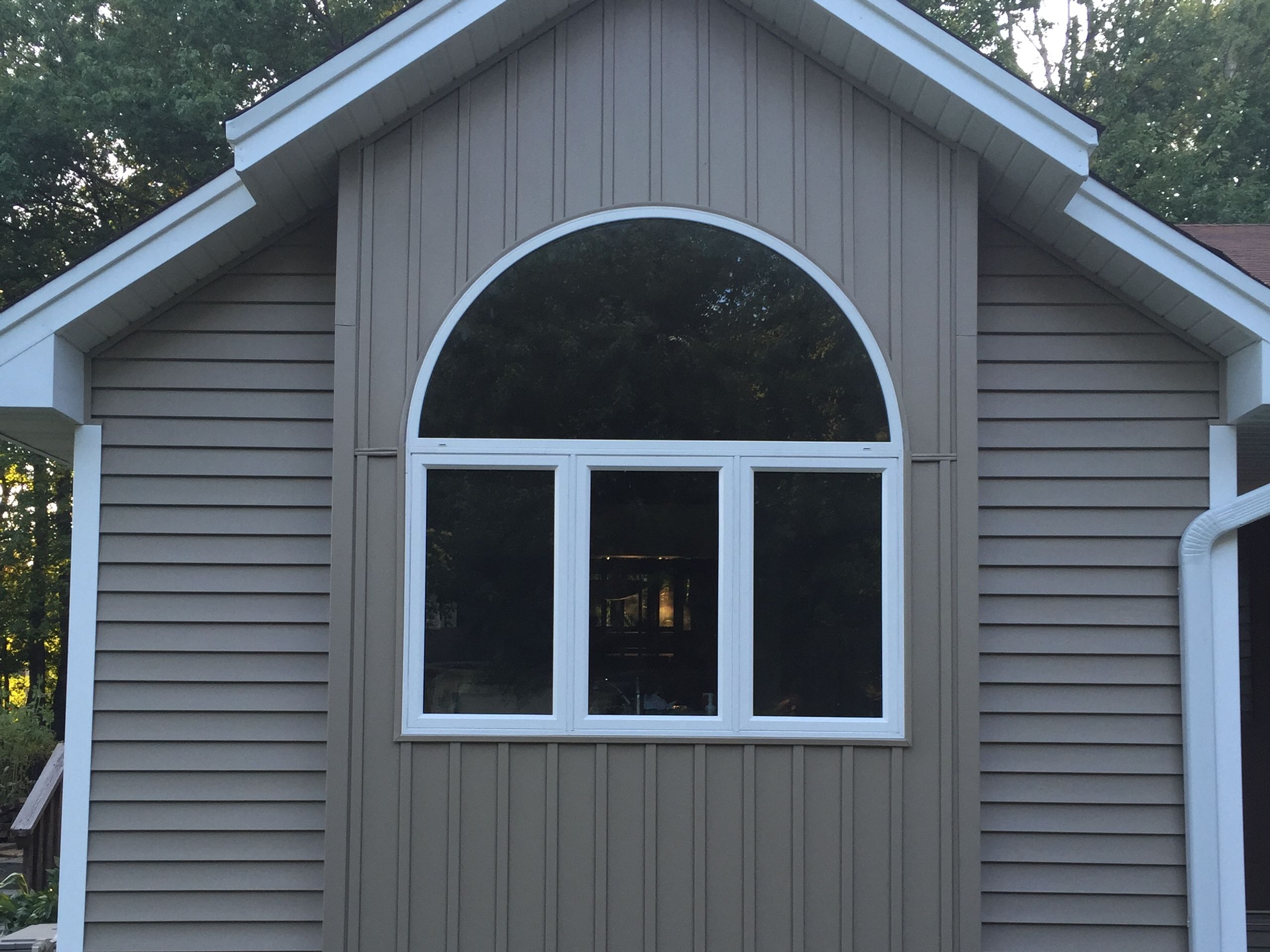 Arched window replaced in a gable end