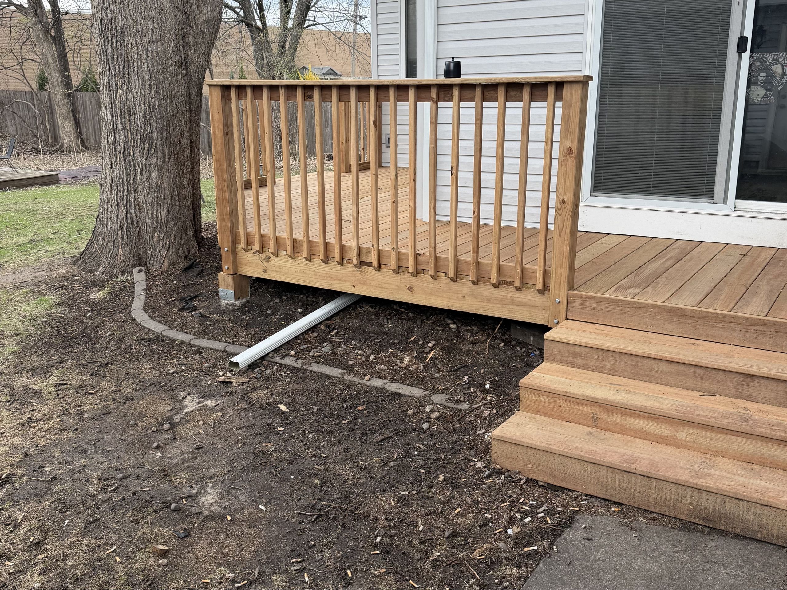 Sliding patio door opening onto a deck