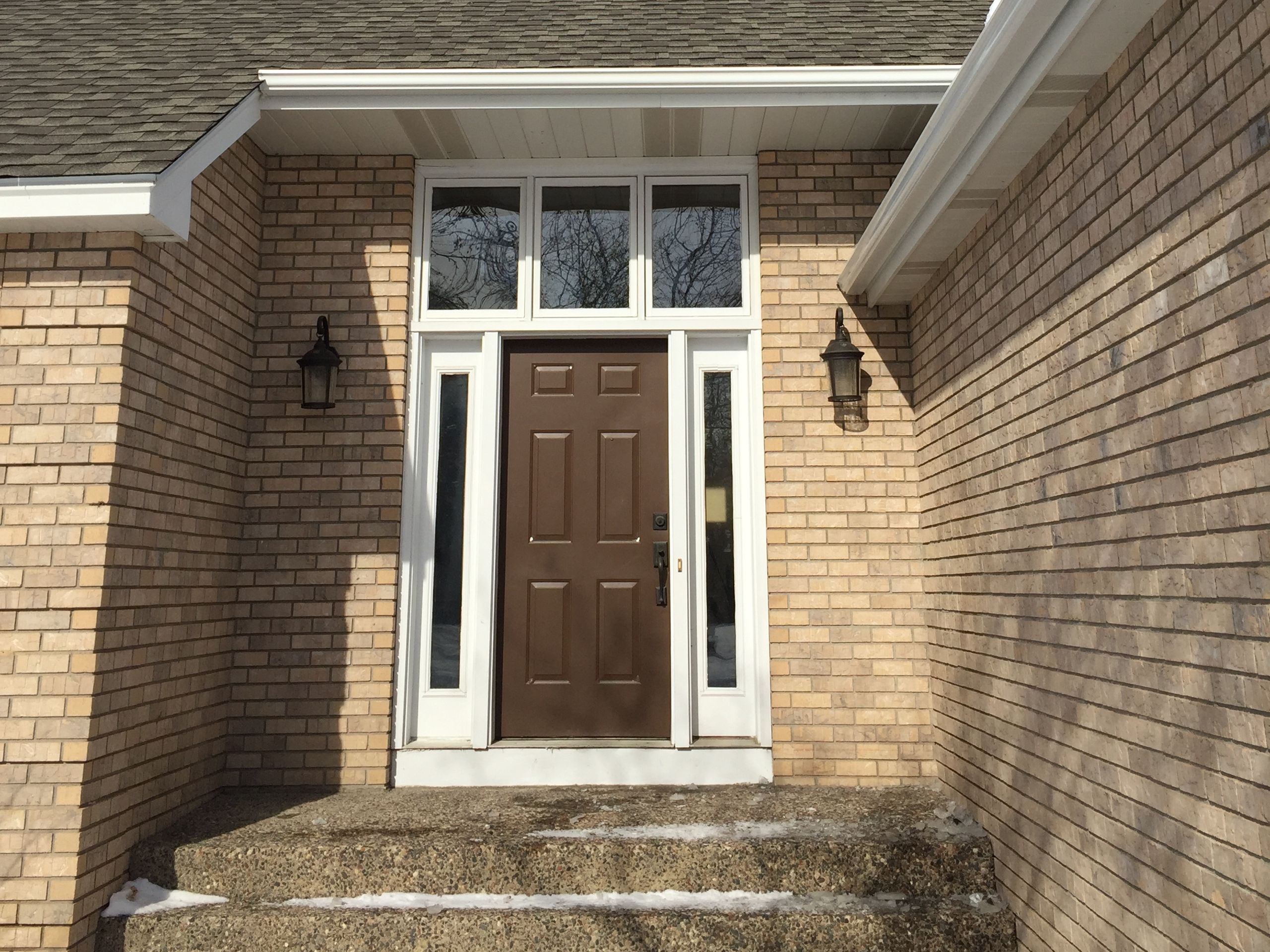 Entry door with sidelights on a finished home